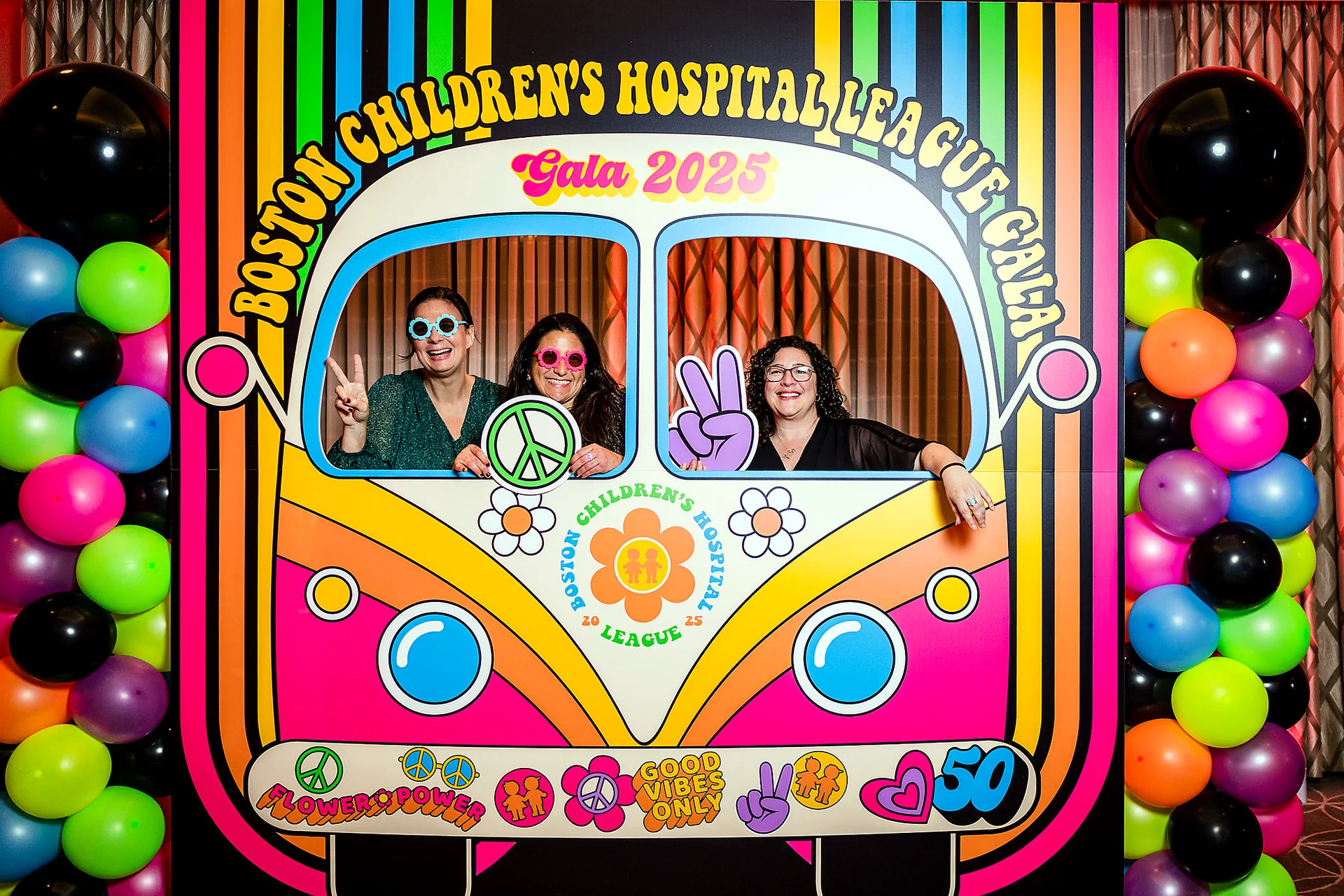Guests participating in a colorful custom event photo activation