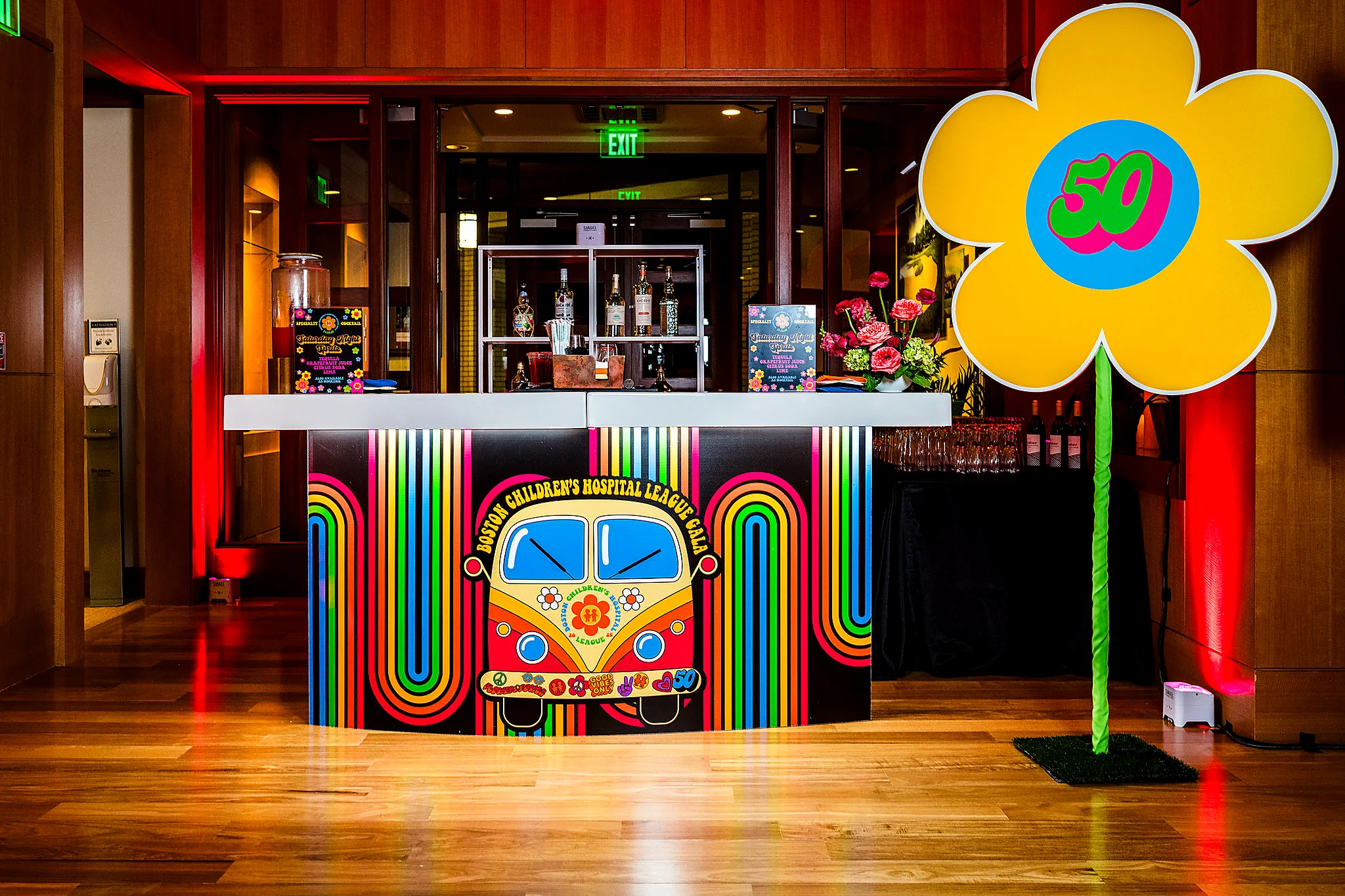 Custom retro event bar with colorful dimensional graphics for a gala